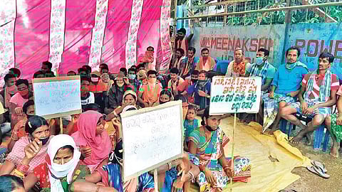 Tribals staging demonstration in front of Meenakshi power plant at Udayagiri