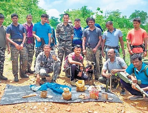 Special Party police display the land mines they recovered from the Koppusuru forest area
