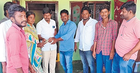 The students’ group provides financial aid to a family which lost its house to fire, in Peddannaluru village of Nellore district | Express