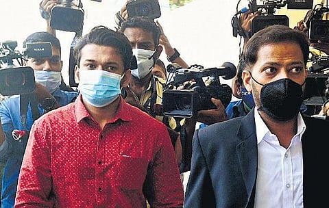 Arjun Ayanki (left) at the customs office in Kochi on Monday | Express
