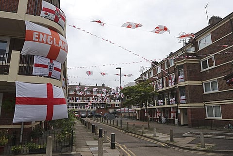 England flags adorn the balconies and landings of the Kirby housing estate in London, Tuesday, June 29, 2021. (Photo | AP)