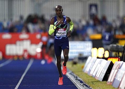 Britain's Mo Farah competes in the Men's 10000m final during day one of the British Athletics Championships at Manchester Regional Arena in England. (Photo | AP)