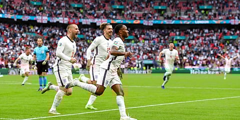 Raheem Sterling celebrates after scoring his side's opening goal during the Euro 2020 championship round of 16 match between England and Germany. (Photo | AP)