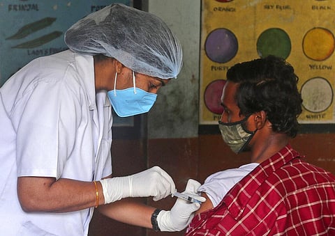 A health worker administers the Covishield vaccine during a special vaccination drive against COVID-19 in Hyderabad. (Photo | AP)