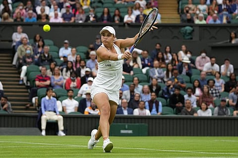 Australia's Ashleigh Barty plays a return to Spain's Carla Suarez Navarro during the women's singles first round match on day two of the Wimbledon Tennis Championships in London. (Photo | AP)
