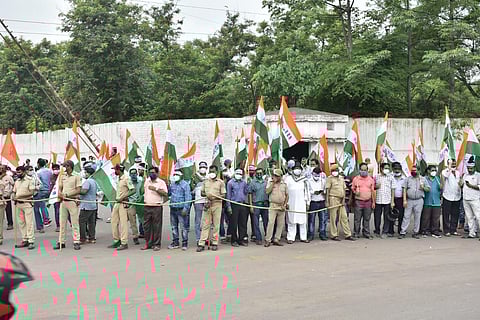 Workers staging a demonstration at Rourkela steel plant on Wednesday. (Photo | EPS)