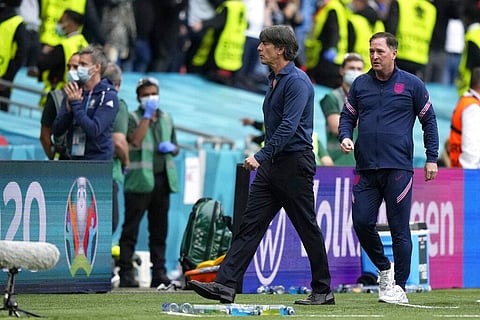 Germany's manager Joachim Loew leaves the field at the end of the Euro 2020 soccer championship round of 16 match between England and Germany. (Photo | AP)