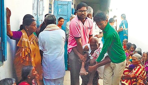 Bisathi Bharath helping the poor at a village in Anantapur district | Express