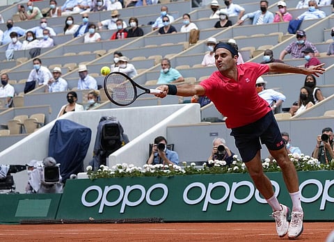 Switzerland's Roger Federer attempts to return serve to Croatia's Marin Cilic during their second round match on day 5, of the French Open tennis tournament. (Photo | AP)