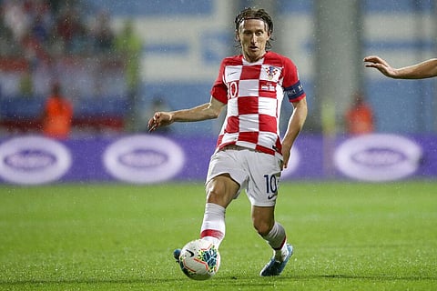 roatia's Luka Modric controls the ball during the Euro 2020 group E qualifying soccer match between Croatia and Slovakia in Rijeka. (Photo | AP)