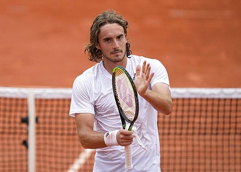 Stefanos Tsitsipas of Greece celebrates after defeating Spain's Pedro Martinez during their second round match on day four of the French Open tennis tournament. (Photo | AP)
