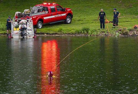 Worcester Fire Department divers search Green Hill Pond after reports of a drowning Friday, June 4, 2021. in Worchester, Mass. (Photo | AP)