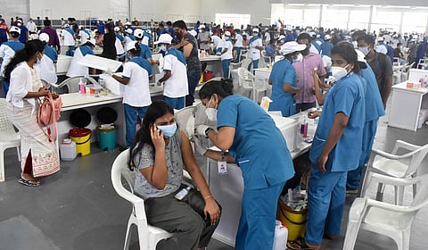 Beneficiaries get vaccinated against Covid-19 in Hyderabad. (Photo | S Senbagapandiyan, EPS)
