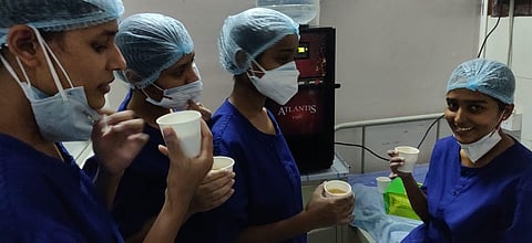 Medical personnel at a government hospital in Bengaluru happy to have a break (Photo | Special arrangement)