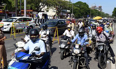 Police checking vehicles after the lockdown relaxations in Chennai on Monday. (Photo | R Satish Babu, EPS)