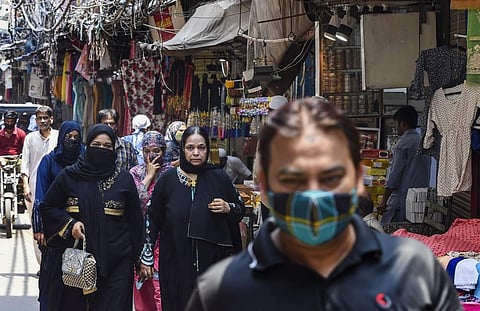 Visitors at the reopened Chitli Qabar market after further ease in the COVID-19 lockdown, in New Delhi, Monday, June 7, 2021. (Photo | PTI)