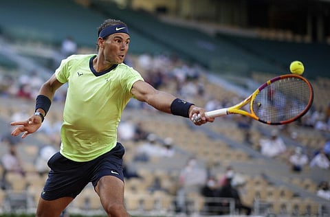 Spain's Rafael Nadal plays a return to Italy's Jannik Sinner during their fourth round match on day 9, of the French Open. (Photo | AP)
