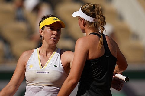 Russia's Anastasia Pavlyuchenkova, left, is to hug Kazakhstan's Elena Rybakina after winning their quarterfinal match of the French Open. (Photo | AP)
