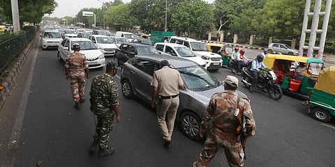 Delhi Police stop commuters during weekend lockdown in New Delhi. (File Photo |  Shekhar Yadav, EPS)