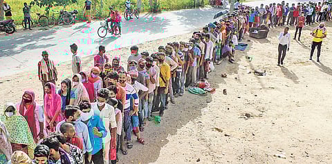 Long queue to get the vaccine at Fazilpur village in Gurugram on Wednesday | PTI