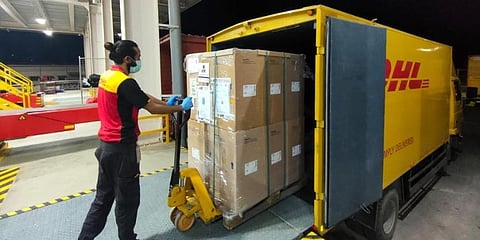 The newly introduced non-contact delivery service harnesses the power of DHL's ODD service and the Global Courier Application Scanners to sync the deliveries with OTPs. (File photo | Twitter)