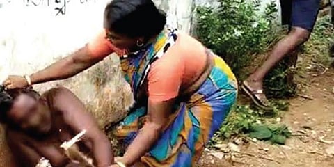 Man being tortured by villagers (Image | Social media video screengrab)