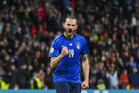 Italy's Leonardo Bonucci reacts after scoring a penalty kick during the Euro 2020 soccer championship semifinal match between Italy and Spain at Wembley stadium in London. (Photo | AP)