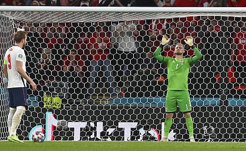 Denmark's goalkeeper Kasper Schmeichel prepares for England's Harry Kane, left, to take a a penalty kick during the Euro 2020 semi-final. (Photo | AP)