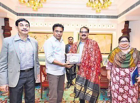 Industries Minister K T Rama Rao presents a memento to Kitex Group  CMD Sabu Jacob during a meeting in Hyderabad on Friday