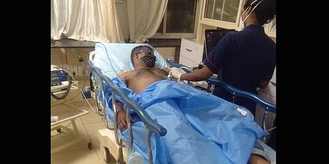 Radhakrishna in the hospital after  the alleged assault by the police.