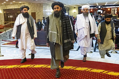 Taliban co-founder Mullah Abdul Ghani Baradar, center, arrives with other members of the Taliban delegation for an international peace conference in Moscow, Russia. (File Photo | AP)