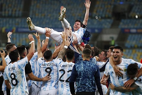 Teammates lift Argentina captain Lionel Messi after beating Brazil 1-0 in the Copa America final at the Maracana stadium in Rio de Janeiro. (Photo | AP)
