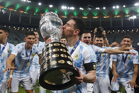 Victorious captain Lionel Messi of Argentina kisses the Copa America trophy. (Photo | AP)