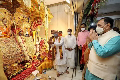 Gujarat CM Vijay Rupani offers prayers at Jagannath Temple on the eve of the annual 'Rath Yatra' festival, in Ahmedabad, Sunday, July 11, 2021. (Photo | PTI)