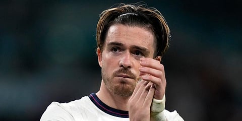 England's Jack Grealish claps hands to supporters after losing the penalty shootout of the Euro 2020 soccer championship final between England and Italy at Wembley Stadium. (Photo | AP)