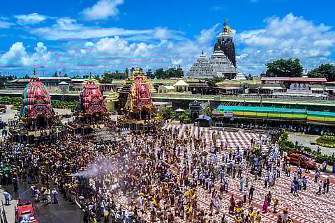 The three decked-up chariots of Lord Jagannath and his siblings rolled out on Puri's Grand Road during the annual Rath Yatra on Monday, July 12, 2021. (Photo|Biswananth Swain, EPS)
