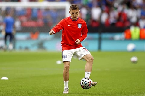 England's Kieran Trippier plays with a ball during warmup before the Euro 2020 soccer championship final. (Photo | AP)