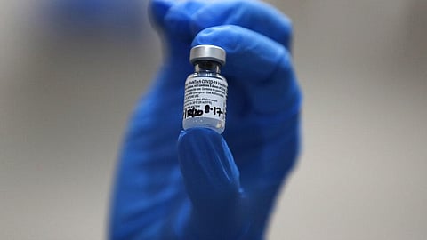 A nurse holds a phial of the Pfizer-BioNTech COVID-19 vaccine. (Photo | AP)