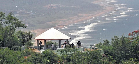 Tourists enjoy beach view in Visakhapatnam. (Photo| G Satyanarayana, EPS)