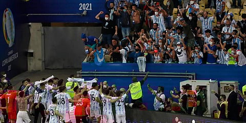 Argentina's players celebrate with fans after beating 1-0 Brazil in the Copa America final soccer match at the Maracana stadium in Rio de Janeiro, Brazil, Saturday, July 10, 2021. (Photo | AP)