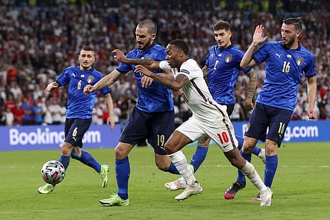 England's Raheem Sterling vies for the ball with Italy's Leonardo Bonucci, 2nd left, during the Euro 2020 final match at Wembley stadium in London, Sunday, July 11, 2021. (Photo | AP)