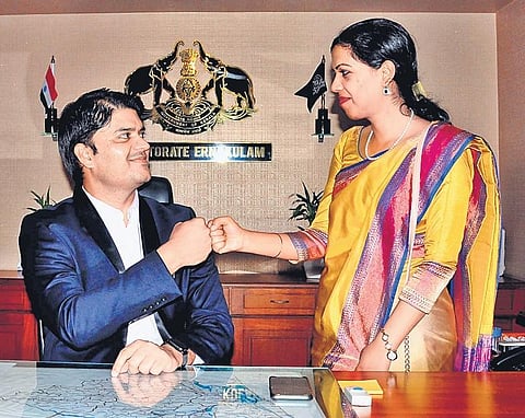 Power couple: After taking charge, Ernakulam District Collector Jafar Malik fist bumps his wife and Ernakulam development commissioner Afsana Parveen at the collectorate on Monday | A Sanesh
