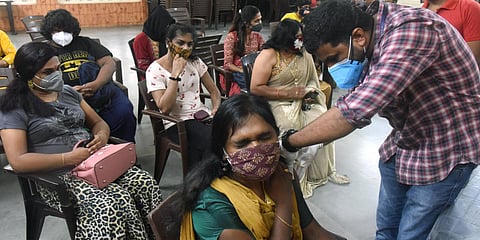 A transgender receives a dose of the COVID-19 vaccine, in Kochi. (Photo| ANI)