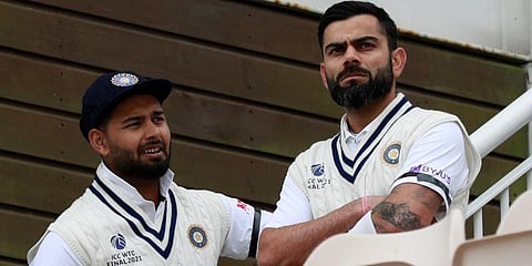 India skipper Virat Kohli (R) with wicketkeeper-batsman Rishabh Pant. (Photo | AP)