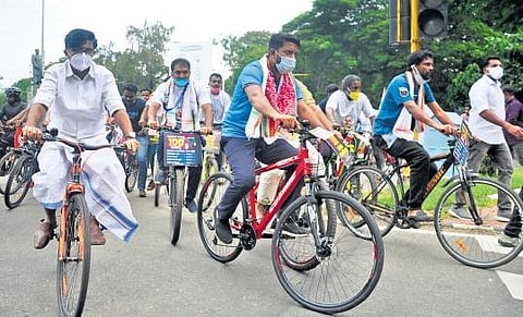 YC activists led by MLA Shafi Parambil arrive in front of Raj Bhavan on Thursday at the culmination of the 100-km cycle rally taken out in protest against the rise in fuel prices | B P Deepu