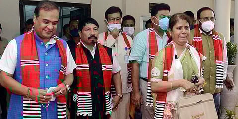 Assam Chief Minister Himanta Biswa Sarma, Finance Minister Ajanta Neog, others on their way to present the State Budget 2021-22. (Photo | ANI)