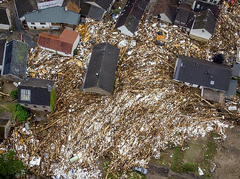 Debris of houses and trees surround houses in Schuld, Germany, Friday, July 16, 2021. (Photo | AP)