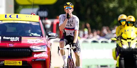Slovenia's Matej Mohoric gestures to be quiet as he crosses the finish line to win the nineteenth stage of the Tour de France cycling race over 207 kilometers, July 16, 2021. (Photo | AP)