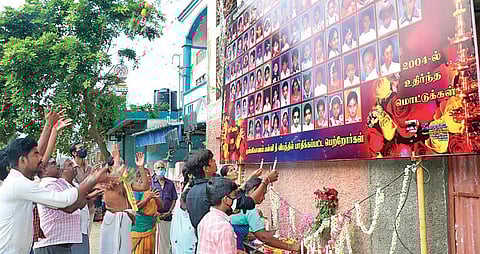 A group of parents and kin of children, who died in a fire tragedy 17 years ago, paying tributes at Sri Krishna Aided School in Kumbakonam on Friday | express