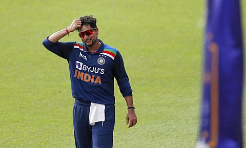 India's Kuldeep Yadav scratches his head while fielding on the first one day international cricket match between Sri Lanka and India in Colombo. (Photo | AP)